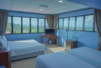 LABIS SUNRISE FARM STAYにあるベッド