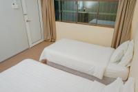 LABIS SUNRISE FARM STAYにあるベッド