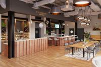 ein Restaurant mit Bar sowie Tischen und Stühlen in der Unterkunft Riverbend Hotel and Suites, Trademark Collection by Wyndham in Ashtabula