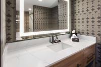 Ein Badezimmer in der Unterkunft Riverbend Hotel and Suites, Trademark Collection by Wyndham