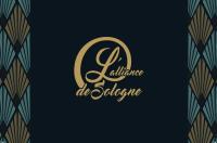 een gouden logo op een zwarte achtergrond bij L'alliance de Sologne in Romorantin