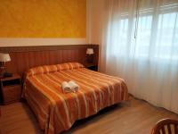 Łóżko lub łóżka w pokoju w obiekcie Hotel Kristall