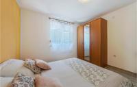 Postel nebo postele na pokoji v ubytování Holiday Home Betiga Betiga