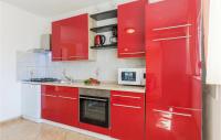 Kuchyň nebo kuchyňský kout v ubytování Holiday Home Betiga Betiga