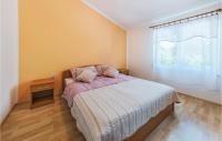 Postel nebo postele na pokoji v ubytování Holiday Home Betiga Betiga