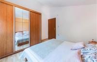 Postel nebo postele na pokoji v ubytování Holiday Home Betiga Betiga