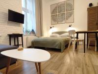 Posteľ alebo postele v izbe v ubytovaní Apartament "Stay with Us"