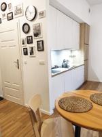 Kuchyňa alebo kuchynka v ubytovaní Apartament "Stay with Us"