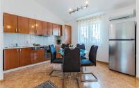 Kuchyň nebo kuchyňský kout v ubytování Holiday Home Betiga Betiga