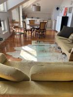 Posedenie v ubytovaní Penthouse And Piano Nobile PRKG WiFi Garden Near Beach Away From Roads