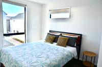 Brand New Close to CBD 3 Bed 3 Bath with Garageにあるベッド