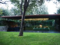 a pavilion with a table in a park at Les Cols Pavellons in Olot