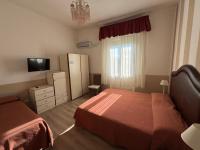 Postel nebo postele na pokoji v ubytování Hotel Le Focette