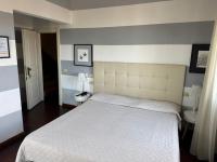 Postel nebo postele na pokoji v ubytování Hotel Le Focette