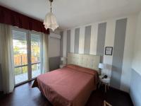 Postel nebo postele na pokoji v ubytování Hotel Le Focette