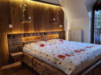 Postel nebo postele na pokoji v ubytování Apartmán Refrino na jedinečném místě