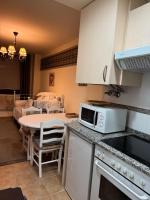Kuchyň nebo kuchyňský kout v ubytování Moderno apartamento a pie de pista en la Estación de San Isidro