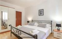 Łóżko lub łóżka w pokoju w obiekcie Apartment Prizba Bb Iv