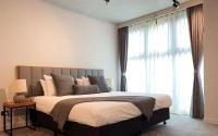 Clarion Apartments South Melbourneにあるベッド