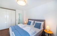 Posteľ alebo postele v izbe v ubytovaní Cozy Home In Privlaka