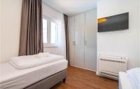 Posteľ alebo postele v izbe v ubytovaní Cozy Home In Privlaka