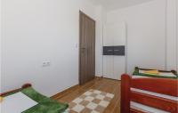 Posteľ alebo postele v izbe v ubytovaní Two-Bedroom Apartment Saldun With Sea View 08