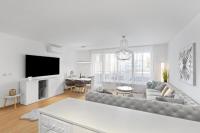 Televízia a/alebo spoločenská miestnosť v ubytovaní Apartment Puma v centre Piešťan