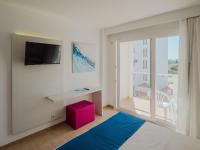 Postel nebo postele na pokoji v ubytování Hotel La Santa Maria
