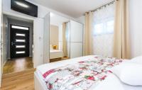 Posteľ alebo postele v izbe v ubytovaní Four-Bedroom Holiday Home In Sibenik