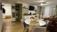 TV a/nebo společenská místnost v ubytování Apartment Tsarevets View