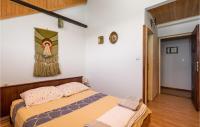 Posteľ alebo postele v izbe v ubytovaní Beautiful Home In Fuzine With Sauna