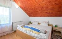 Posteľ alebo postele v izbe v ubytovaní Beautiful Home In Fuzine With Sauna