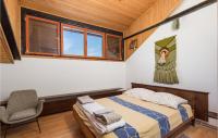 Posteľ alebo postele v izbe v ubytovaní Beautiful Home In Fuzine With Sauna
