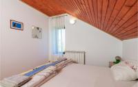 Posteľ alebo postele v izbe v ubytovaní Beautiful Home In Fuzine With Sauna