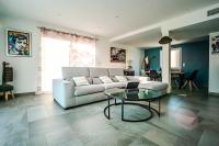 Posedenie v ubytovaní La villa de Domi 4 chambres piscine