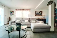 Posedenie v ubytovaní La villa de Domi 4 chambres piscine