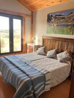 Postel nebo postele na pokoji v ubytování Cara norte de Gredos