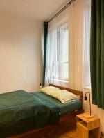 Posteľ alebo postele v izbe v ubytovaní Room in Old Town Krakow