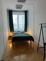 Posteľ alebo postele v izbe v ubytovaní Room in Old Town Krakow