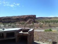 a building in the middle of a desert at Hais Ra Tented Campsite in Khorixas