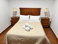 Posteľ alebo postele v izbe v ubytovaní Apartamento San Fernando