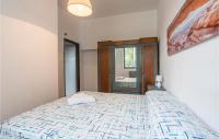 A bed or beds in a room at Nice Home In Modica With Wifi