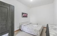 A bed or beds in a room at Nice Home In Modica With Wifi