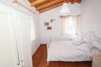 Postel nebo postele na pokoji v ubytování Villa Petra