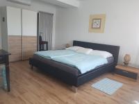Postel nebo postele na pokoji v ubytování Hamo Apartments & Soba