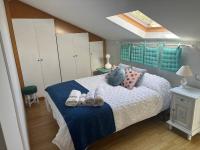 Posteľ alebo postele v izbe v ubytovaní Apartamento Saint Michael Blue