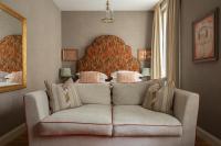A bed or beds in a room at Vmaison Brera Milano