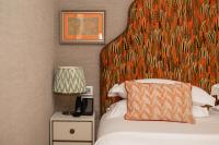 A bed or beds in a room at Vmaison Brera Milano