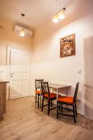 Posedenie v ubytovaní All In Apartman