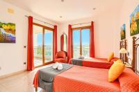 Postel nebo postele na pokoji v ubytování Villa Cala Nit by Villa Plus